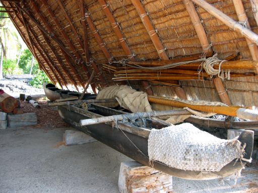 Canoe inside halau on beach